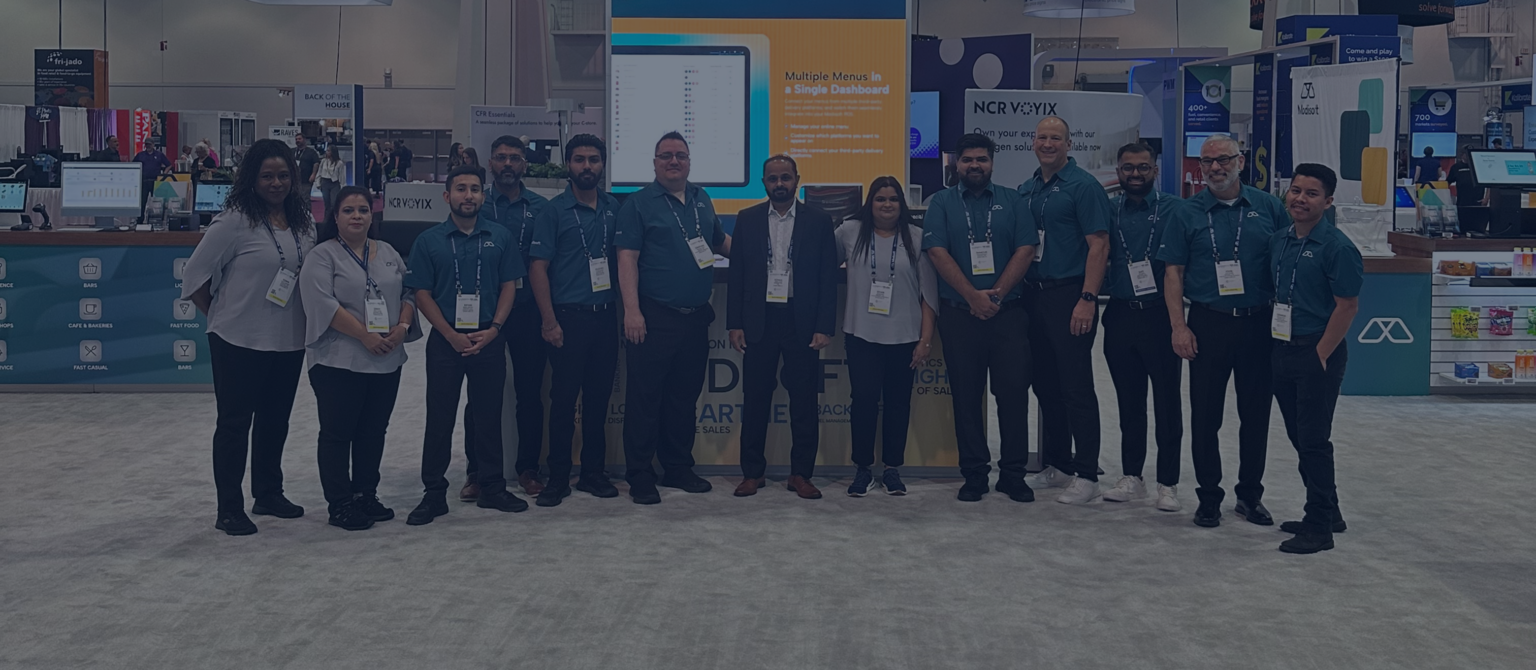 Modisoft employees at an industry event with career opportunities messaging and great place to work certification badge displayed.