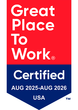 Great Place to Work Certified 2025 USA display surrounded by branded celebration props recognizing workplace culture achievements.