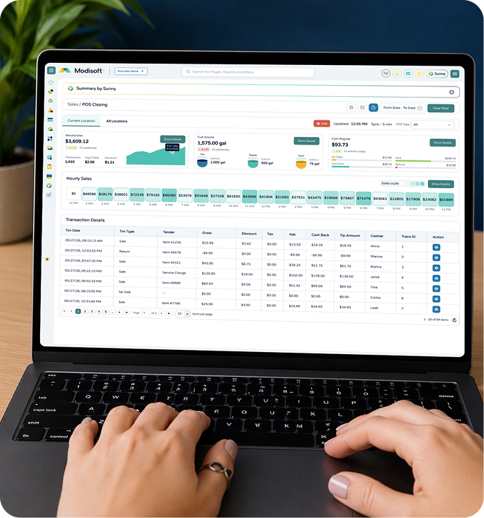 Modisoft back office dashboard on a laptop